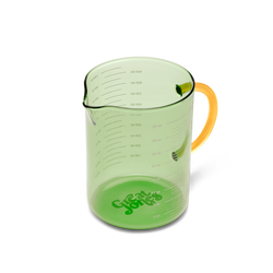 Green measuring cup with yellow handle on a white background