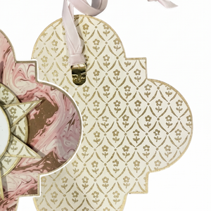 Decorative gift tags with floral and geometric patterns on a white background