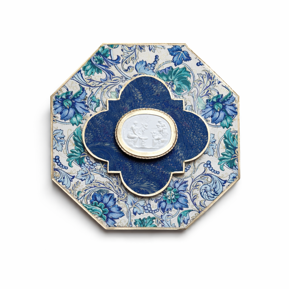 Decorative plate with blue floral design on a white background