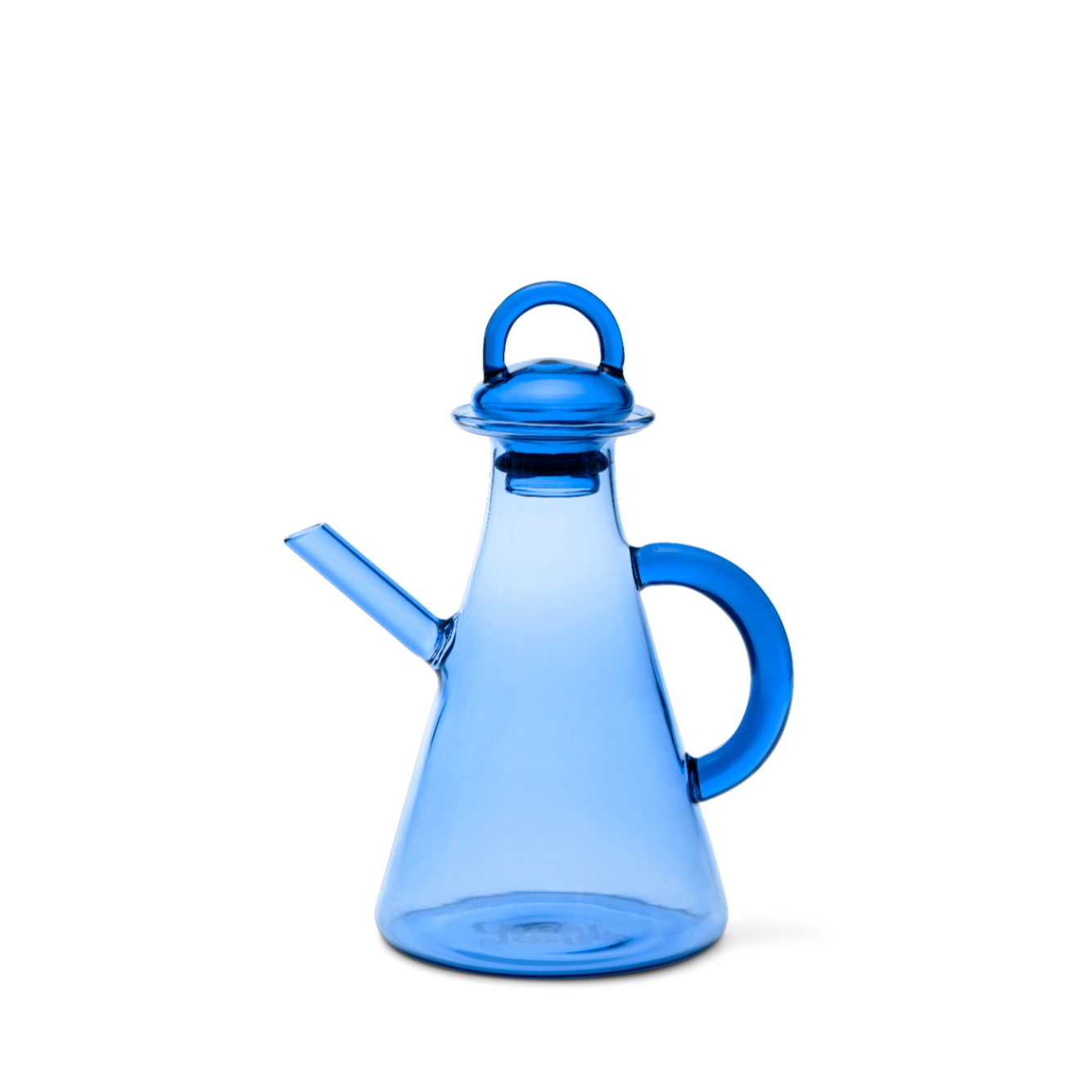 Blue glass oil bottle with a handle on a white background