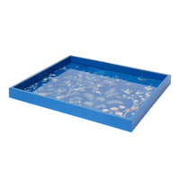 Blue tray with floral design on a white background